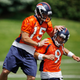 Image for article titled Someone's Trying To Stop The Tim Tebow-Brady Quinn Catfight
